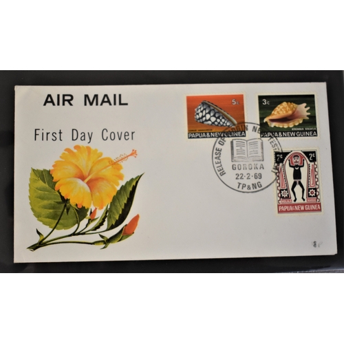 290 - Papua New Guinea 1967-1974 small album of First Day Covers (24)