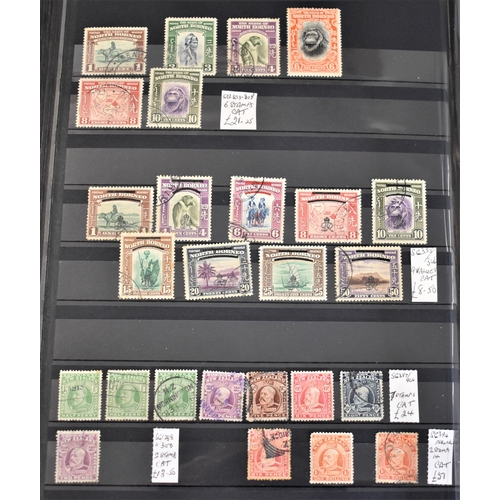 317 - British Commonwealth - A deluxe maroon Lighthouse jumbo stock book with good Canada, New Zealand and... 