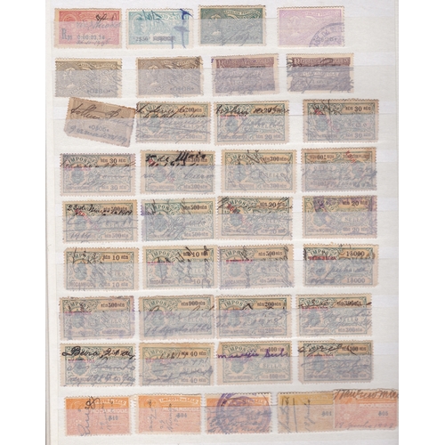288 - Portugal (Mozambique)- large stock book with mint Revenue and Tax Stamps used and mint in large bloc... 