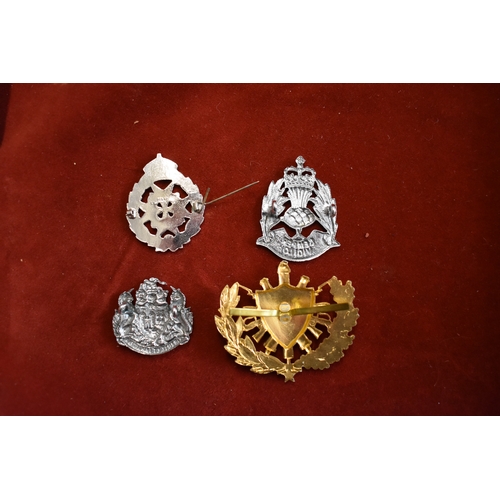 231 - Police and Military Cap Badges (4) Scottish Constabulary, St. John's Ambulance etc.