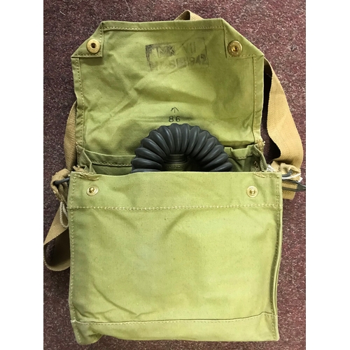 220 - British WWII Army Issue MKVII Gas Mask and carry satchel with any dimming compound, the bag stamped ... 