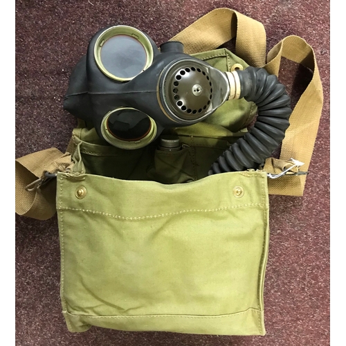 220 - British WWII Army Issue MKVII Gas Mask and carry satchel with any dimming compound, the bag stamped ... 