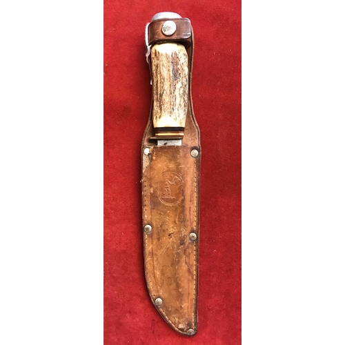 57 - Bowie Knife made by Kienel & Peel, Solingen with Stag handle and matching stamped leather sheath.