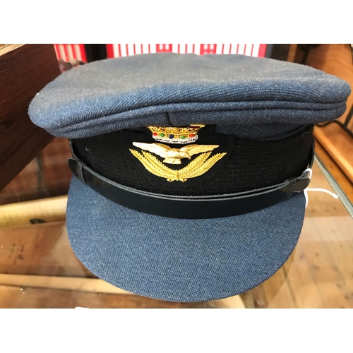 69 - British Cold War era RAF Officers Service Dress Peaked Cap by Kay Headdress, the crown a KC as often... 