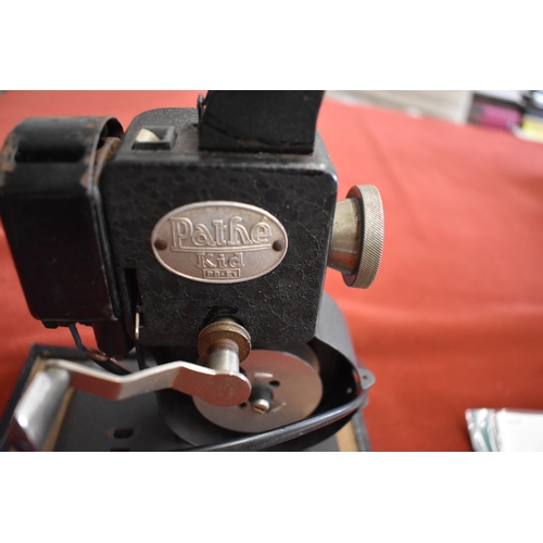 461 - Pathé 'Kid' 9.5mm film projector. Produced in the 1930's It was basic and was
hand cranked. Comes wi... 