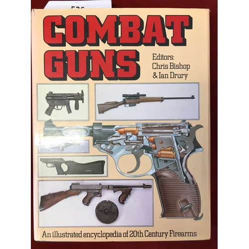 526 - Combat Guns by Chris Bishop & Ian Drury, Hardback copy with original dust cover. A large encyclopaed... 