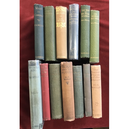 577 - A nice lot of HG Wells books and magazines, including Bealby: A Holiday First edition, no D/W, faded... 