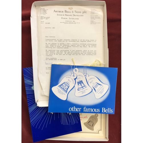 772 - Bells Scotch Whisky - A Complete Bell's swing tickets with certificate, a copy of Pride of Perth key... 