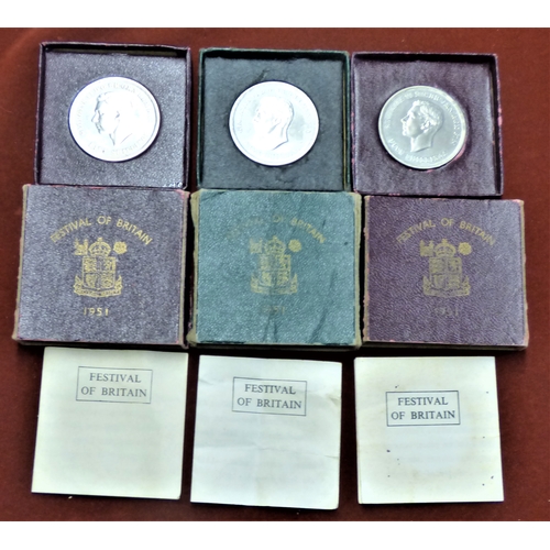 122 - 1951 Festival of Britain Crowns, cased two maroon and one green (3)