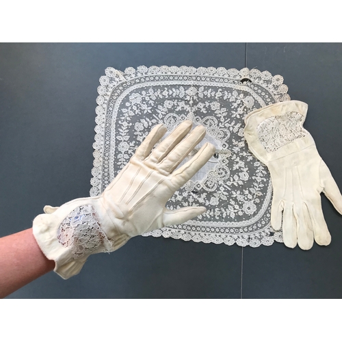 334 - Pair of 1930s fine chamois leather gloves with lace inserts and a Carickmacross lace bordered mat, l... 