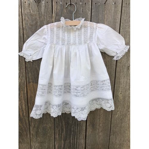 301 - Fine handsewn Victorian cotton infant dress with deep border of pintucks, inserts of Valenciennes la... 