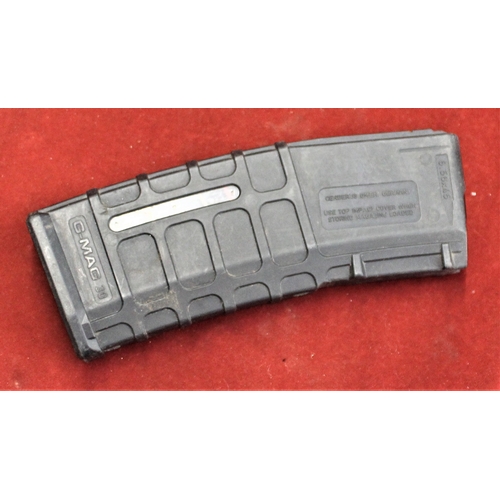 31 - American AR-15 magazine, made by G-MAG 30, fits 5.56 rounds in used condition