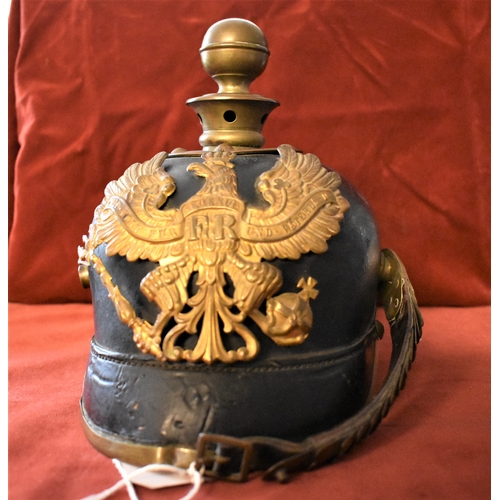 69 - German WWI Prussian Artillery Pickelhaube helmet, fitted with metal front plate depicting the Prussi... 