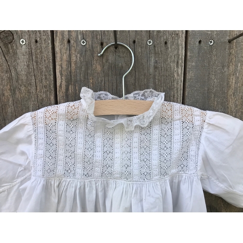 301 - Fine handsewn Victorian cotton infant dress with deep border of pintucks, inserts of Valenciennes la... 