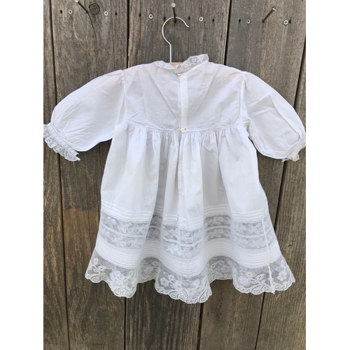 301 - Fine handsewn Victorian cotton infant dress with deep border of pintucks, inserts of Valenciennes la... 