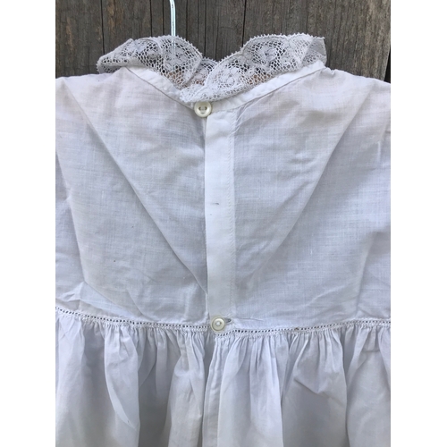 301 - Fine handsewn Victorian cotton infant dress with deep border of pintucks, inserts of Valenciennes la... 