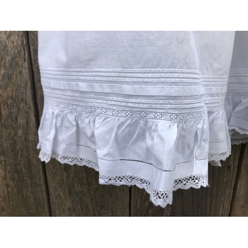 303 - Handsewn Victorian sleeveless Christening dress/petticoat in fine cotton. Pintucks frill hem with fa... 