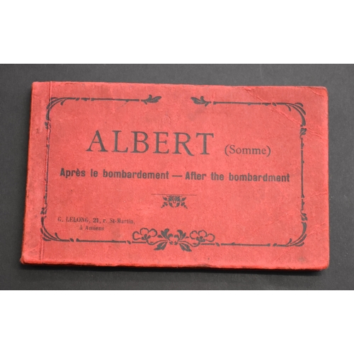 84 - Albert (Somme) 'Après le bombardment - After the Bombardment' Postcard Booklet, a stapled cover with... 