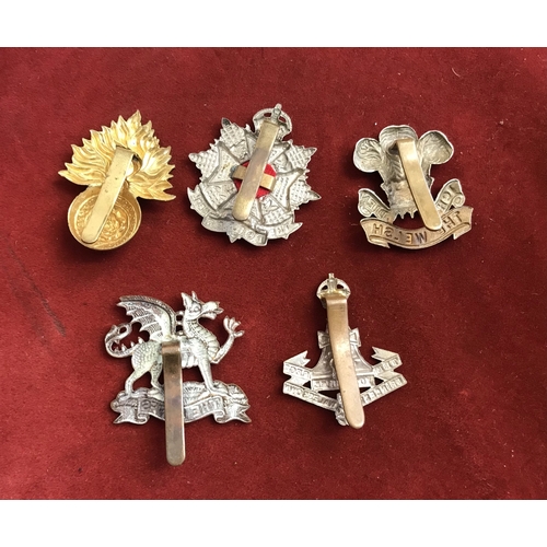 70 - British Military Cap Badges (5) including: Royal Fusiliers (City Of London Regiment), The Yorkshire ... 