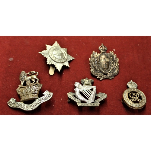 107 - British Military Cap Badges (5) including: The Royal Dragoons, 4th/7th Dragoon Guards, First Life Gu... 