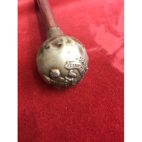 57 - The Welch Regiment WWII Swagger stick, Silver-plated top with brass tip. Shows some signs of wear