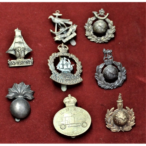 112 - British Military Cap Badges (8) including: Royal Naval Air Service Armoured Car Section, Nelson Batt... 