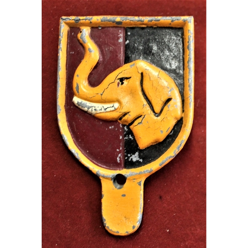 17 - Vintage East African Car Badge - an Elephants Head on black and maroon striped background, scarce