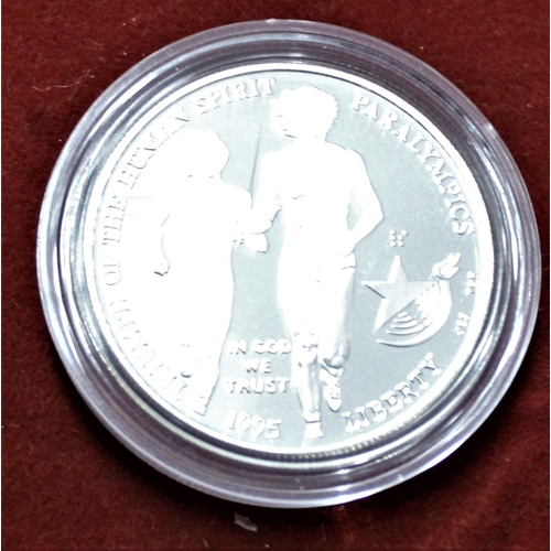 427 - United States 1995 official silver Dollar, Athletics depicting two Runners, BUNC with certificate