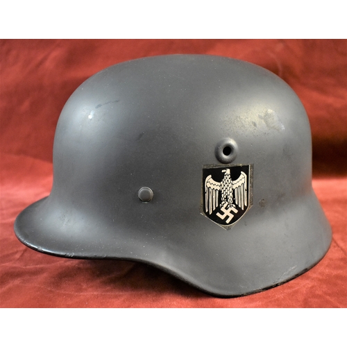 German WWII Stahlhelm helmet which has been repainted and had decals ...