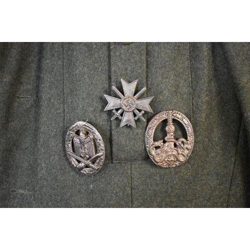 67 - German WWII Replica M43 Sergeant Major (stabsfeldwebel) Uniform jacket and trousers with three repli... 