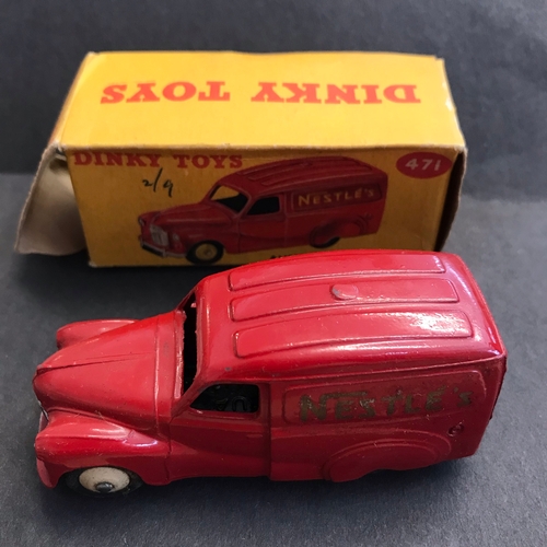 203 - Dinky Toys Austin Van 'Nestles' Red Model 471. Played, worn, boxed. MU £100 Issued Oct 1955