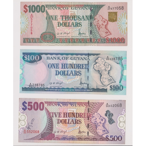 236 - Guyana banknotes 1996 100 dollars (AUNC) 500 dollars VF (unc. with graffiti) and 1000 dollars AUNC (... 