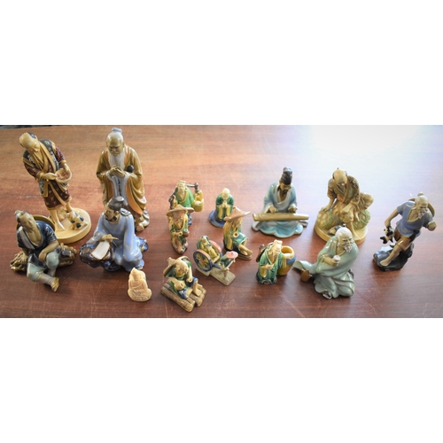 304 - Chinese and Japanese ceramic figurines (16) depicting many figures working. A nice collection, mostl... 