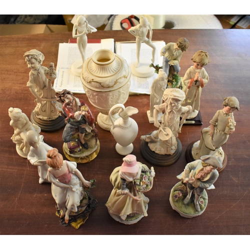 313 - Porcelain and Ceramic figurines and Urn (17) a good mixed lot of Foreign porcelain figurines. A good... 