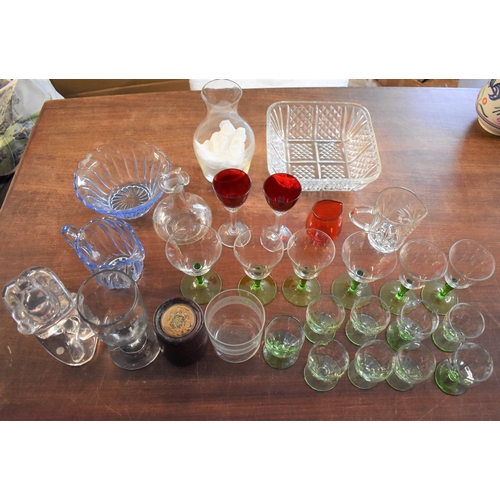 320 - Glassware - a collection of 28 pieces including green based Brandy glasses, a resin sculpture of a l... 