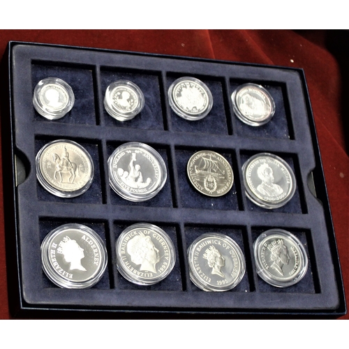 442 - A tray of Silver proof coins in capsules (10) with £5 Guernsey, (3) Alderney, Gibraltar, also Guerns... 