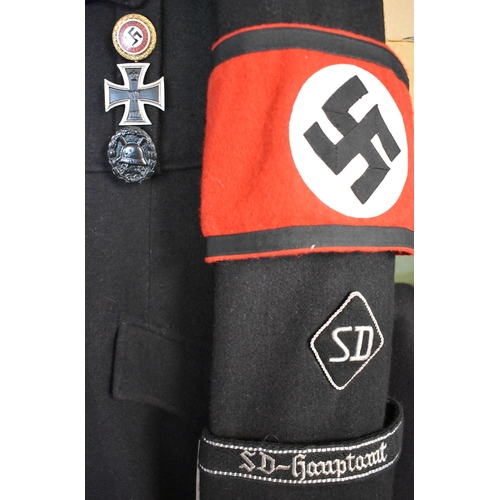 69 - German WWII Replica SS Uniform Jacket and Jodhpur trousers and Officers cap, the jacket at the rank ... 