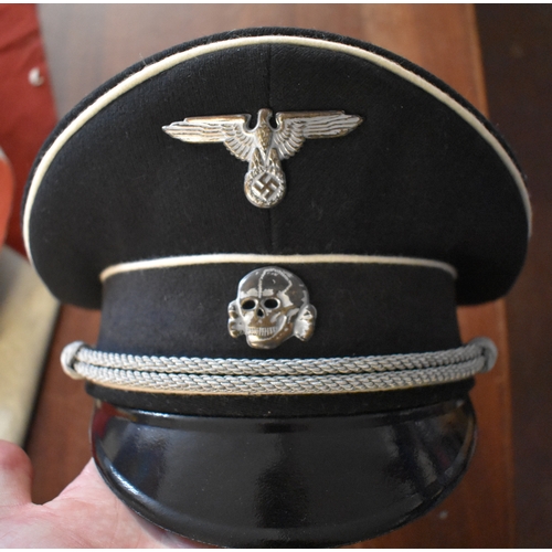 69 - German WWII Replica SS Uniform Jacket and Jodhpur trousers and Officers cap, the jacket at the rank ... 