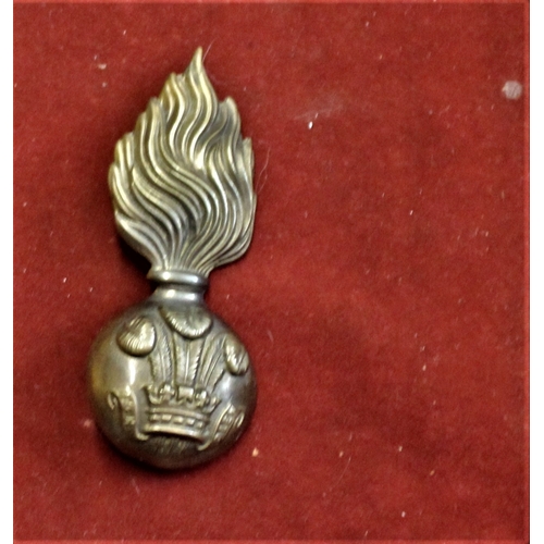 82 - Royal Welsh Fusiliers Brass fur cap grenade with 2 loops to reverse. Ref: Gaylor Plate 9