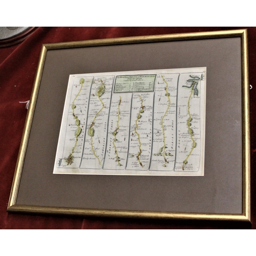 523 - Framed maps including, a print of an old map of the Isle of Wight in a gold frame, brown mount. A fr... 