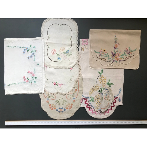 123 - Mixed collection of pretty floral embroidered tray cloths, mats and pyjama case, mostly linen, 1900-... 