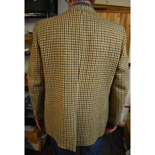 170 - Harris Tweed jacket made by Dunn & Co. Two large flapped hip pockets and one chest pocket.  Three bu... 