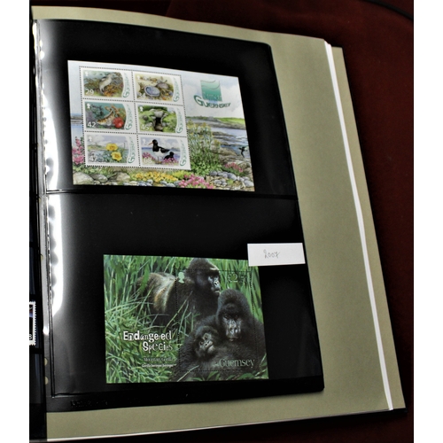 14 - Guernsey 2000-2007 - Album with mounted pages containing u/m sets and miniature sheets on (38) pages... 