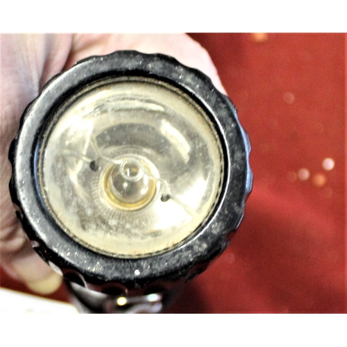 106 - American USAF  Vietnam era black Bakelite Torch, USAF embossed on the side, battery operated, some w... 