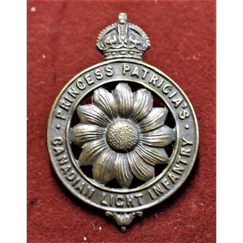 114 - Canadian WWI Princess Patricia's Canadian Light Infantry Cap Badge, (Bronze, lugs)