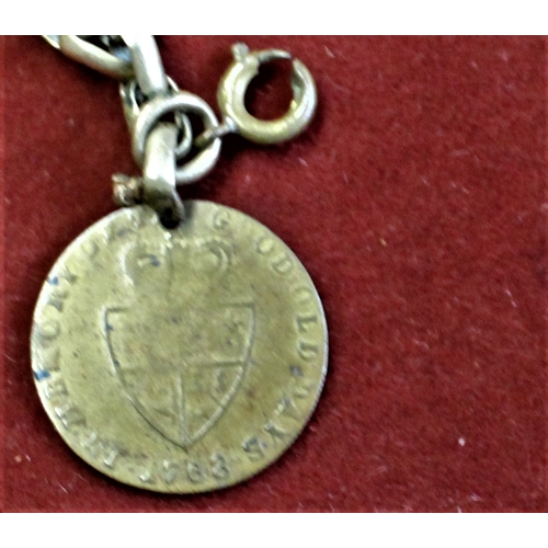 476 - Brass pocket watch fob chain with a George III Sainsbury token as the fob, in good condition with an... 