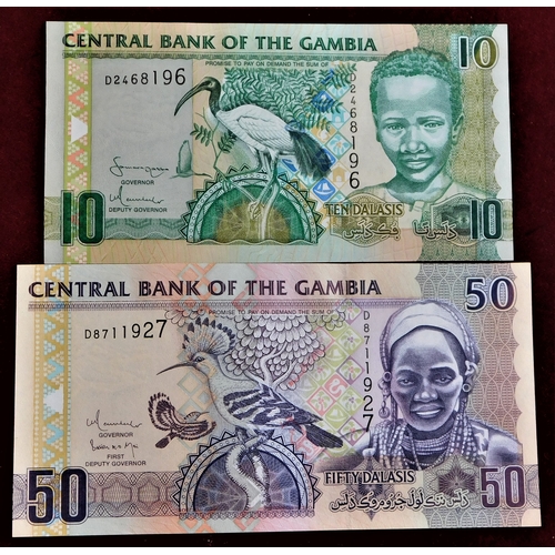 722 - Gambia 1971-2006-range nine notes VG to AUNC