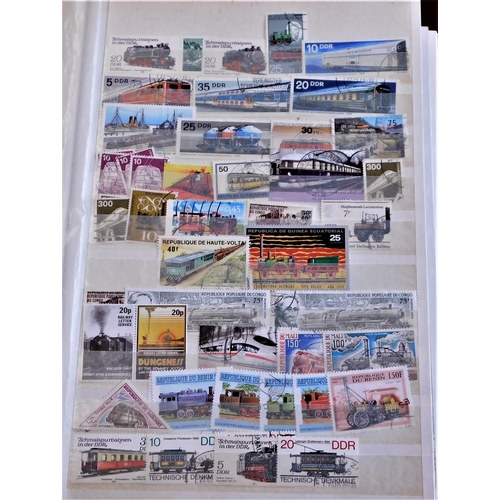 20 - Railway - A Jumbo Stock book of Trains and stamps, worldwide good lot