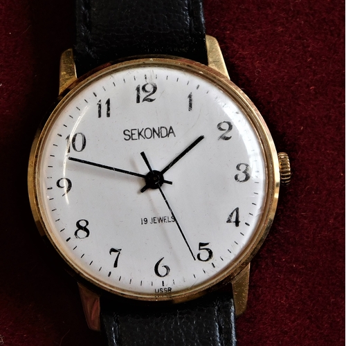 27 - Gents Watch - Boxed Sekonda - with black leather strap needs attention - clear face