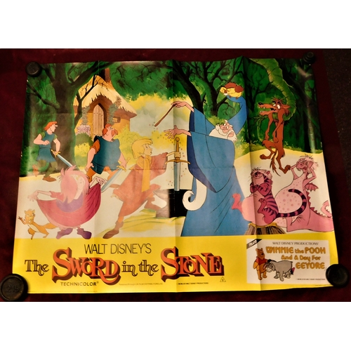 262 - Posters (4) - Walt Disney 'The Sword in the Stone', measurements 100cm x 76cm, 'Dumb & Dumber' starr... 